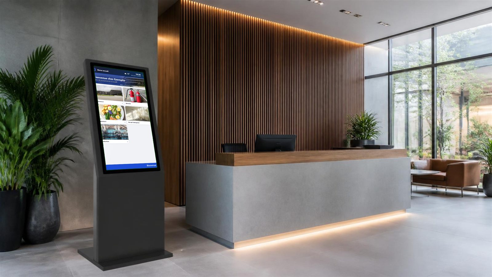 Borne tactile dans le hall d accueil d une entreprise